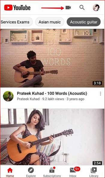 Youtube homepage red arrow point on camera icon.